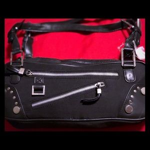 Black bag with silver zippers